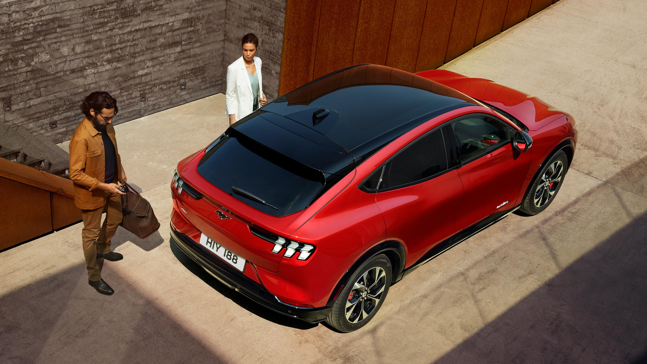 Ford Mustang Mach-E aerial view with man and woman
