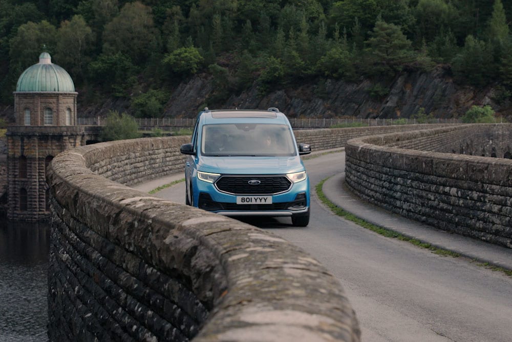 Ford Tourneo Connect driving on winding country road