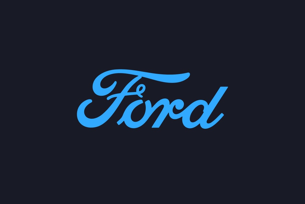 Μπλε σήμα της Ford σε σκούρο φόντο.