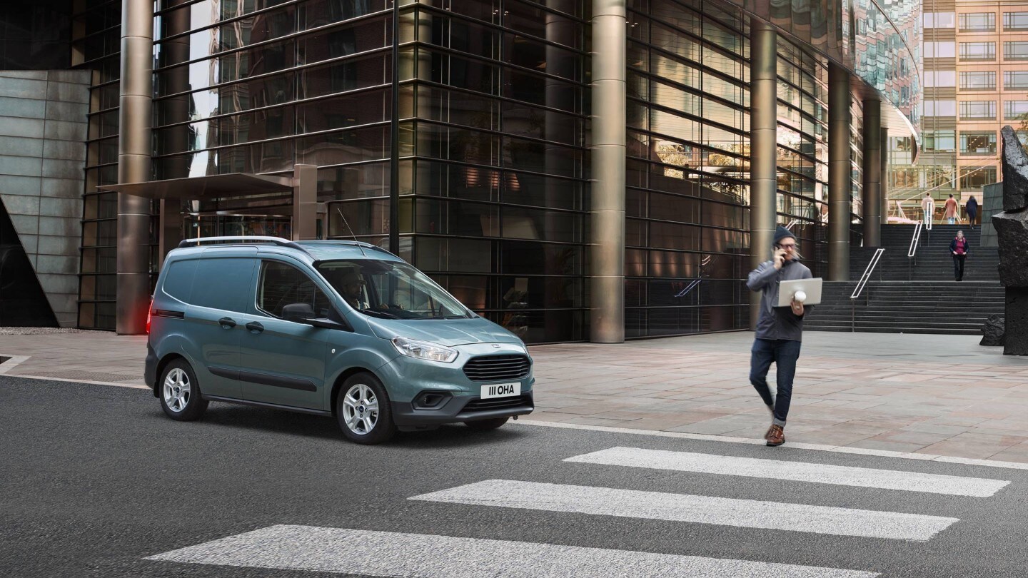 Ford Transit Courier at pedestrian crossing