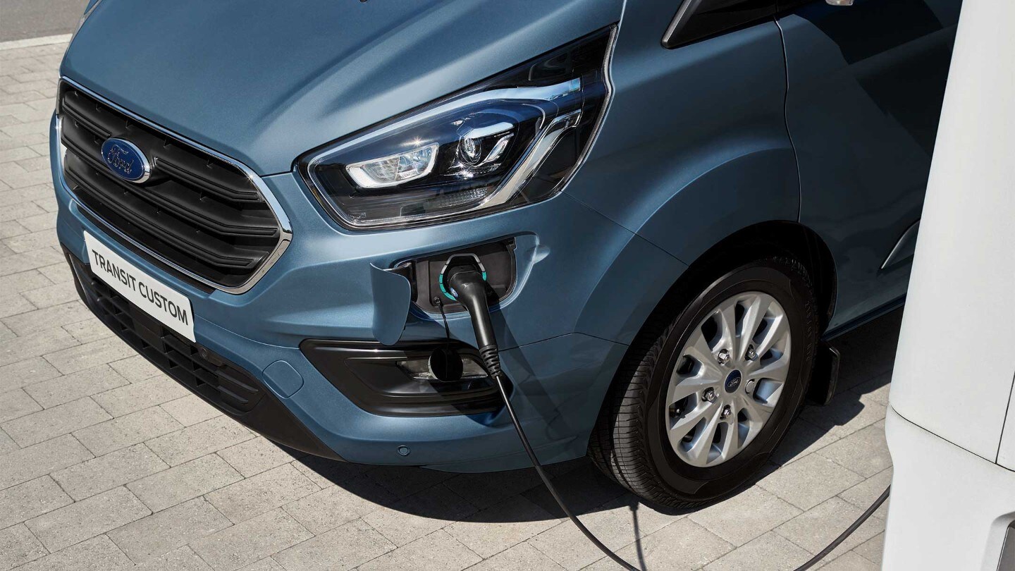 New Blue Ford Transit Custom PHEV charging port close-up