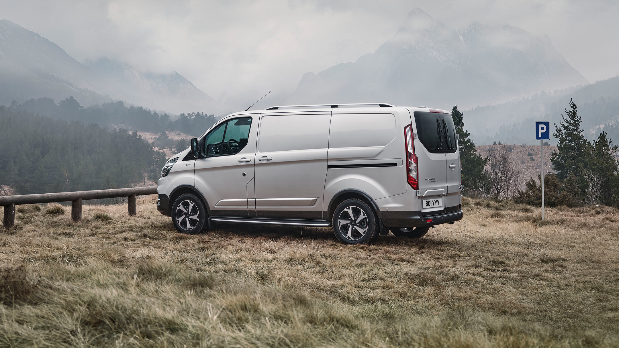 New Blue Ford Transit Custom PHEV driving