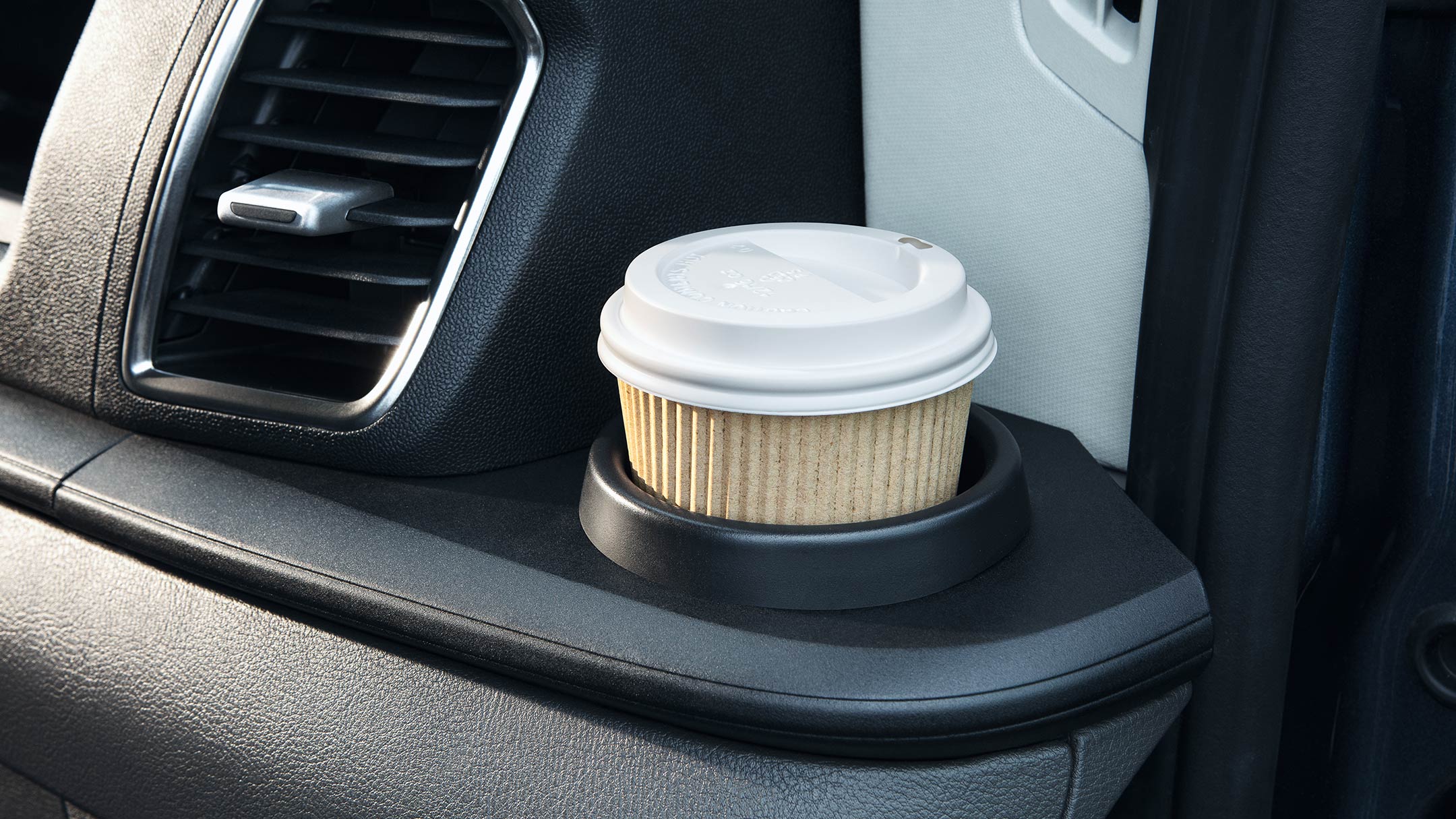Close up on coffee cup holder
