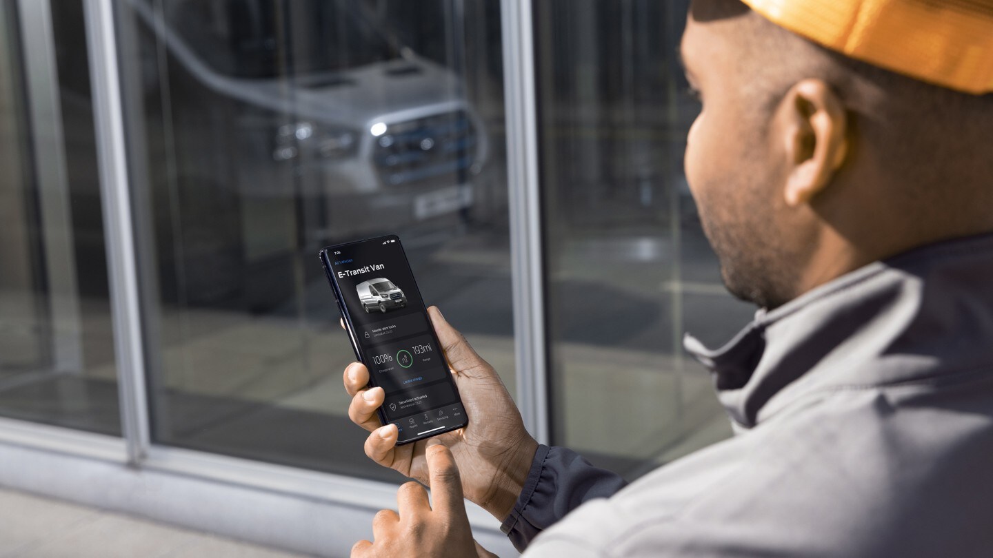 Person looking at his mobile phone