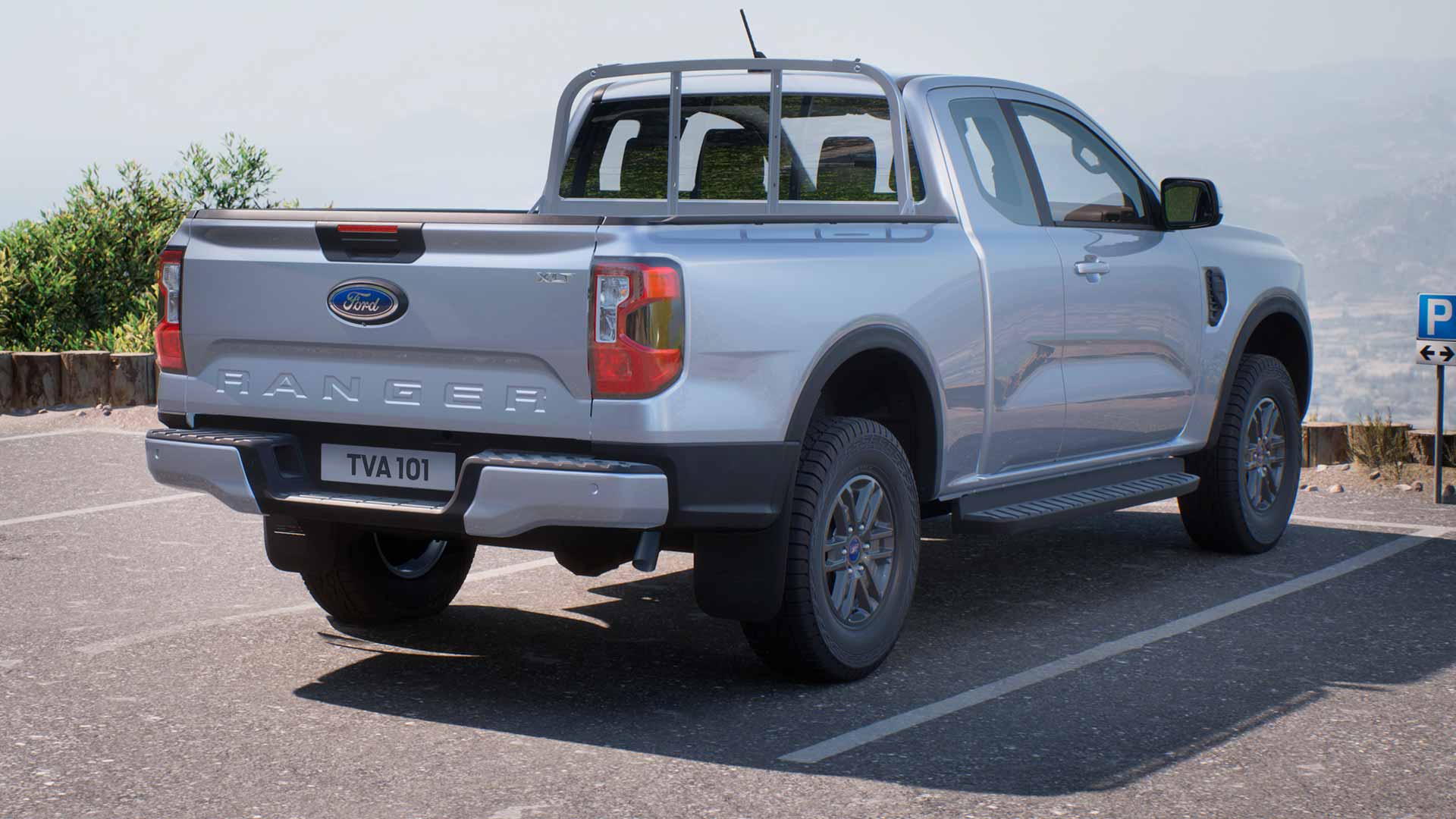 Πίσω όψη ενός ασημένιου σταθμευμένου Ford Ranger Rap Cab XLT
