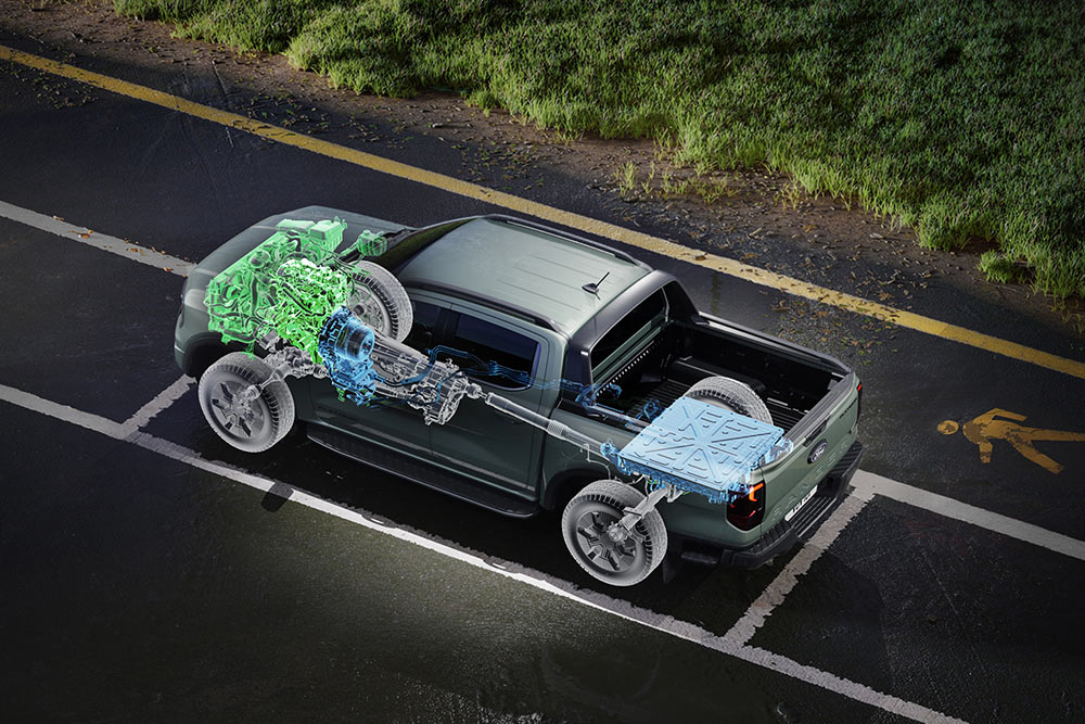 Ford Ranger σταθμευμένο δίπλα σε γρασίδι, με εσωτερική άποψη που εστιάζει στους εσωτερικούς μηχανισμούς του.