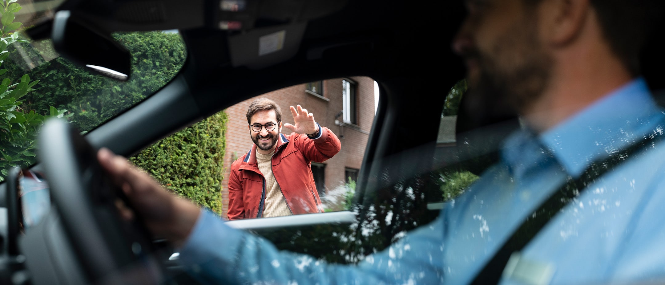 Pick up Delivery service advisor driving away from customers home to workshop