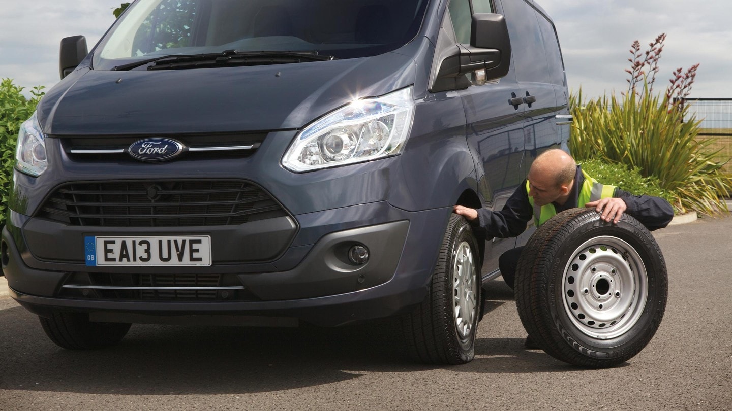 Ford Fleet after sale service 24 hour roadside assistance engineer changing tyre
