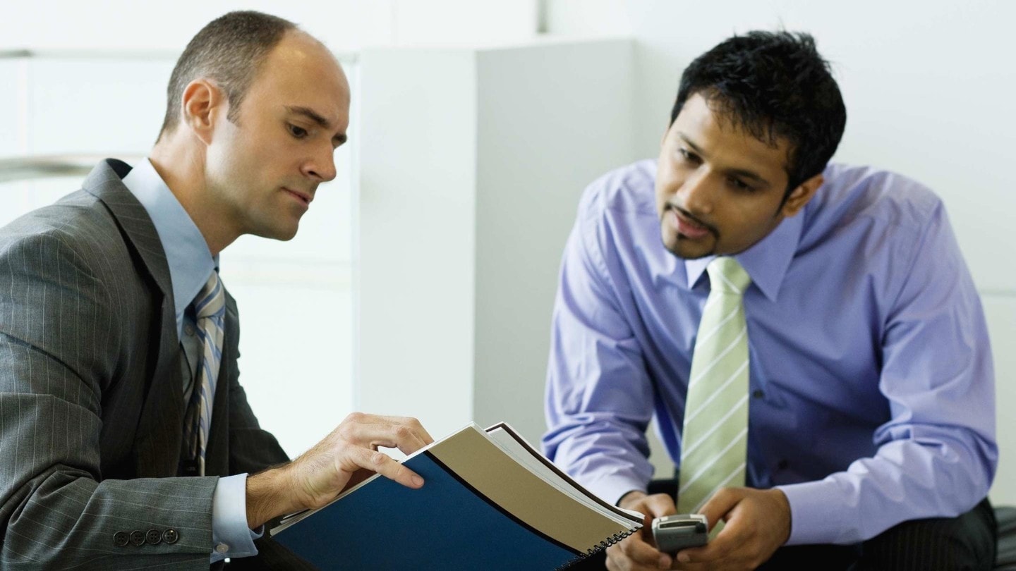 Ford Fleet Financing men discussing